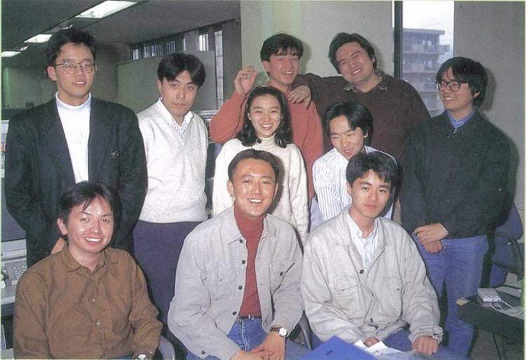 Nagoshi in the middle, and Makoto Osaki on the very left in the development of Daytona USA.